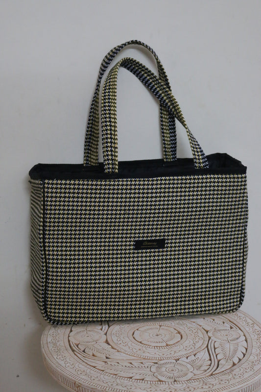 Houndstooth cloth tote bag with reinforced handles
Stylish fabric tote bag featuring houndstooth pattern
Reusable houndstooth shopping bag made from durable cloth
Spacious black and white houndstooth tote for everyday use
Eco-friendly cloth tote with classic houndstooth design