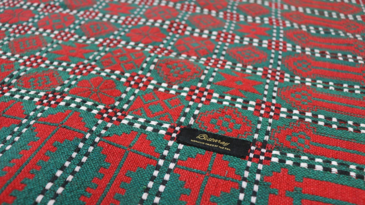 handwoven majnu khes green red - Bistaray
traditional khes shawl handmade Pakistan
majnu khes artisan textile in red and green