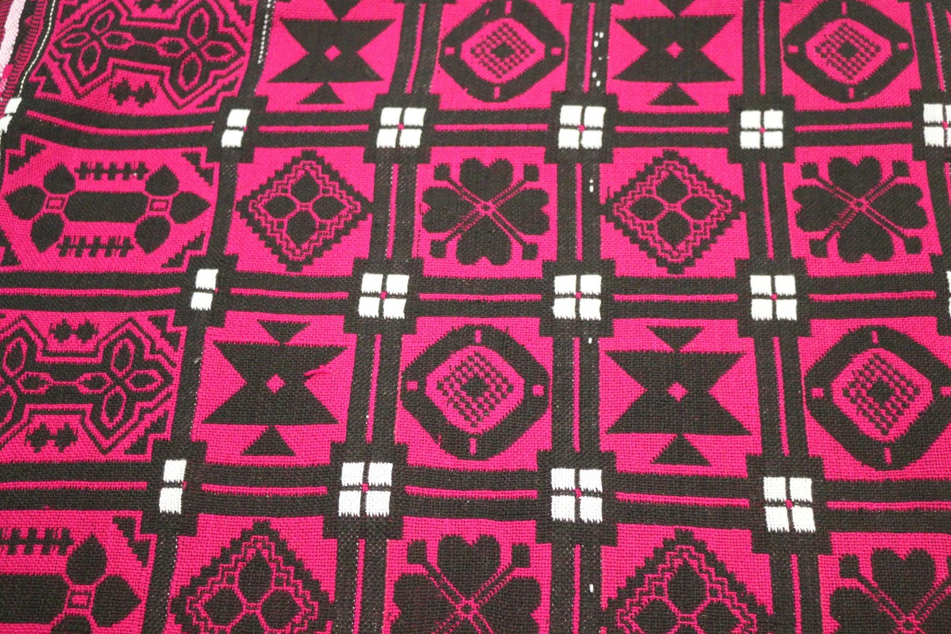 Magenta handwoven khes with geometric black and white motifs – Bistaray