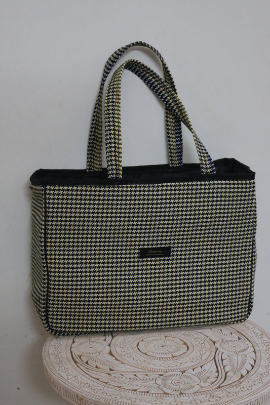 Houndstooth cloth tote bag with reinforced handles
Stylish fabric tote bag featuring houndstooth pattern
Reusable houndstooth shopping bag made from durable cloth
Spacious black and white houndstooth tote for everyday use
Eco-friendly cloth tote with classic houndstooth design