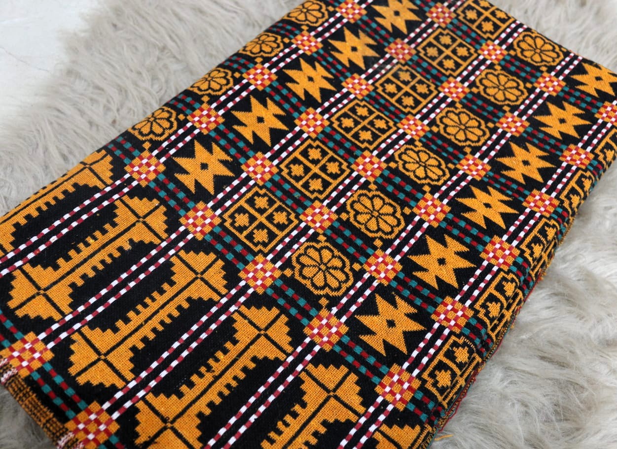 Khes Textile with geometric pattern on a textured surface