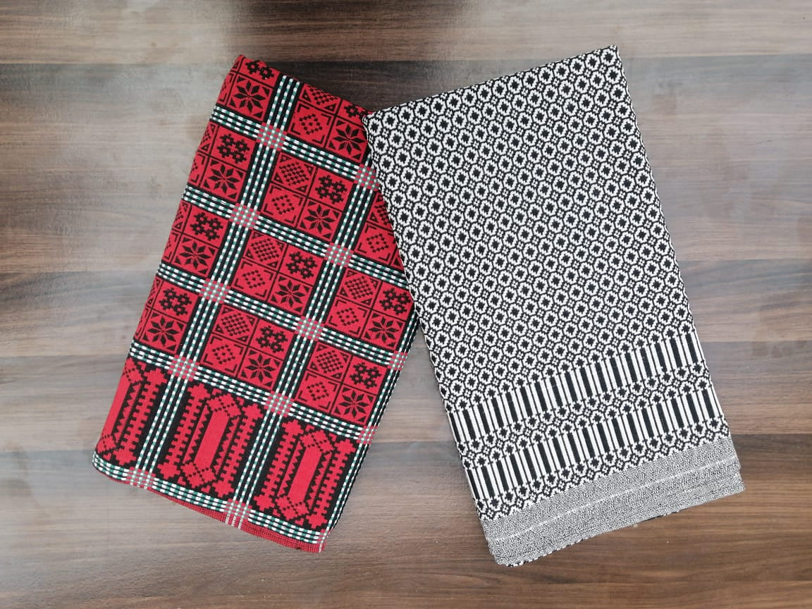 Close‑up of Black & White Cotton Majnu Khes showing geometric double‑cloth pattern and texture.