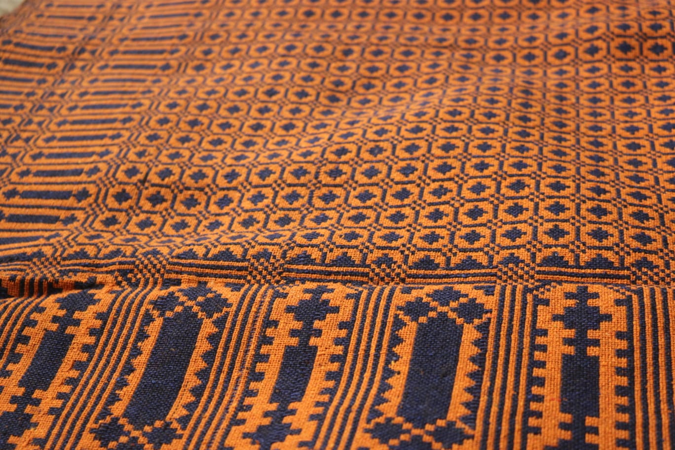 Close-up of orange and black patterned fabric
