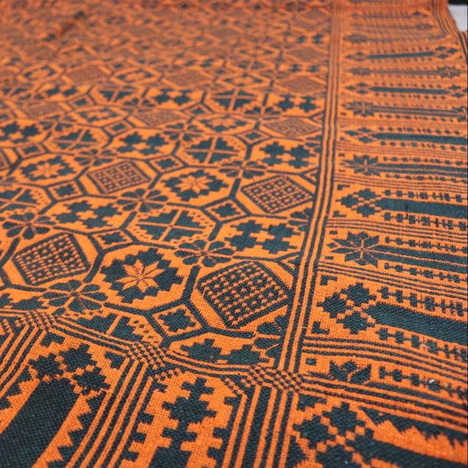 Close-up of orange and black patterned fabric