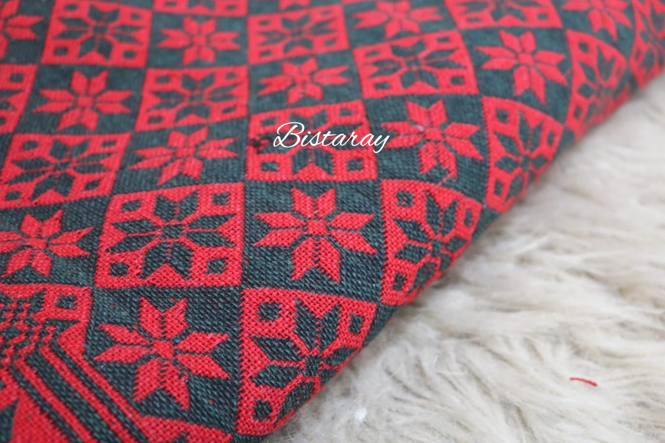 Red and black patterned Khes fabric on a white surface with 'Bistaray' branding.