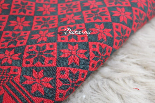 Red and black patterned Khes fabric on a white surface with 'Bistaray' branding.